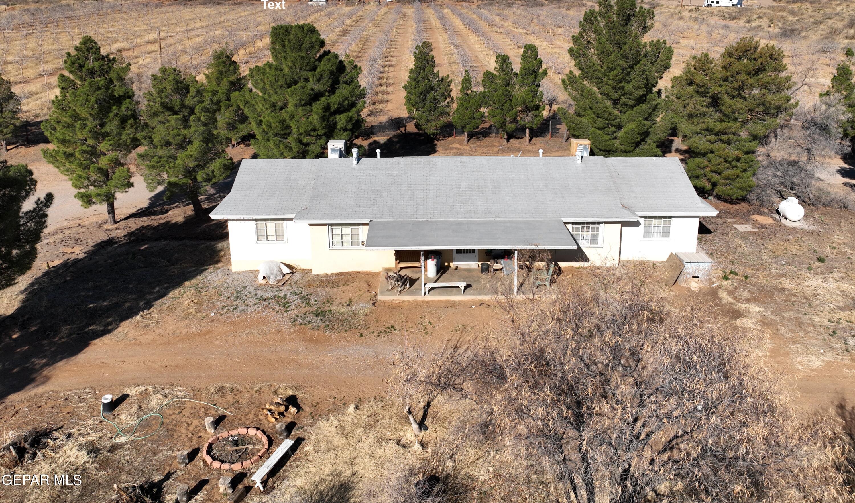 2695 Redstone Street Chaparral, NM 88081 - Photo 16 of 33 an aerial view of a house with yard