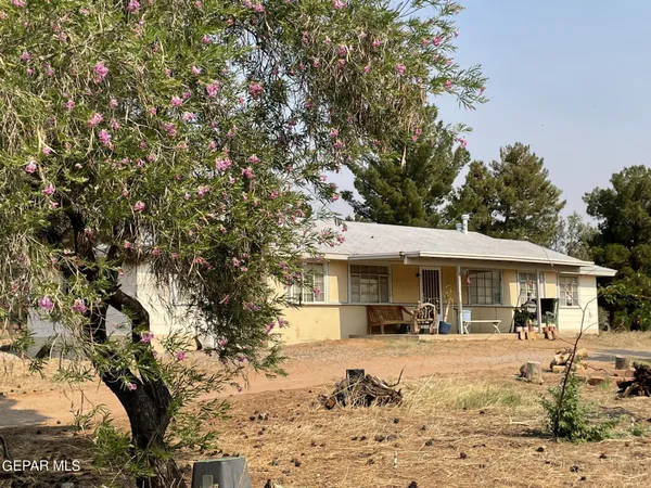 a front view of a house with a patio