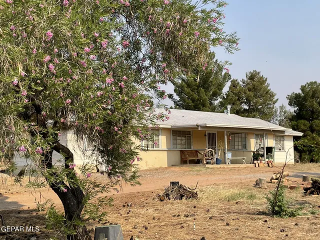 a front view of a house with a patio