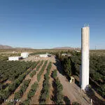 a view of an ocean with a mountain