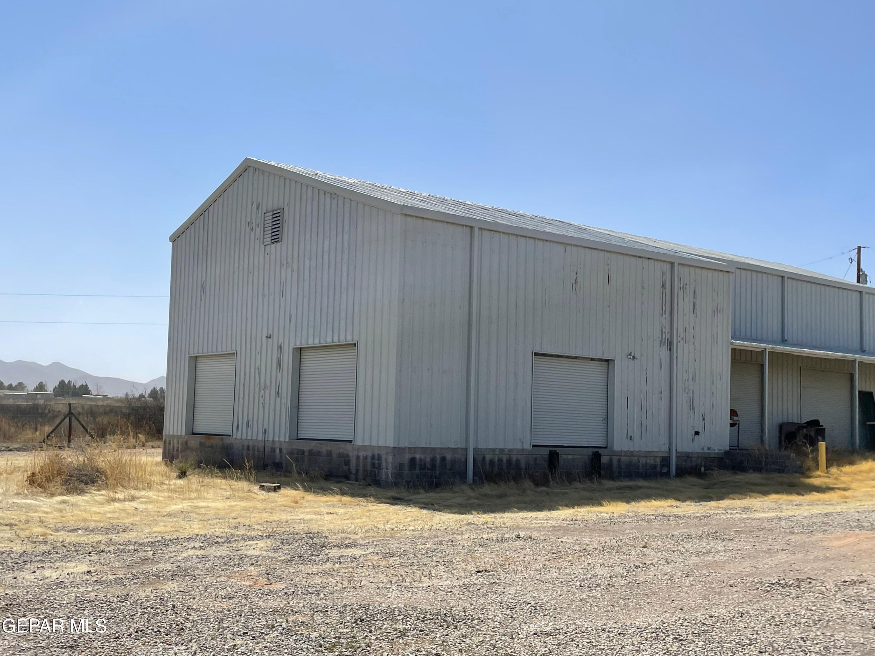 2695 Redstone Street Chaparral, NM 88081 - Photo 7 of 33 a backyard of a house
