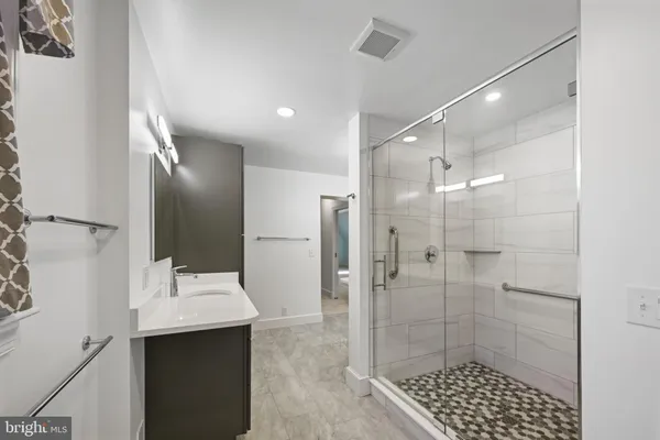 a swimming pool with outdoor seating and yard