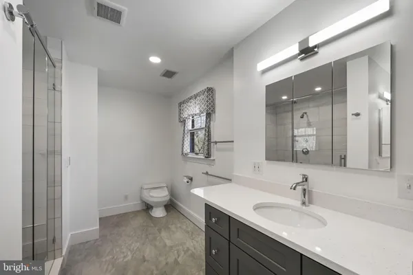 a view of an house with swimming pool garden and trees