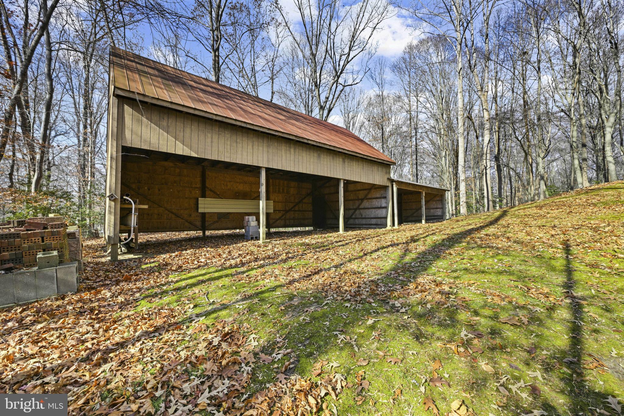 16966 Teagues Point Road Hughesville, MD 20637 - Photo 42 of 72 Tractor shed