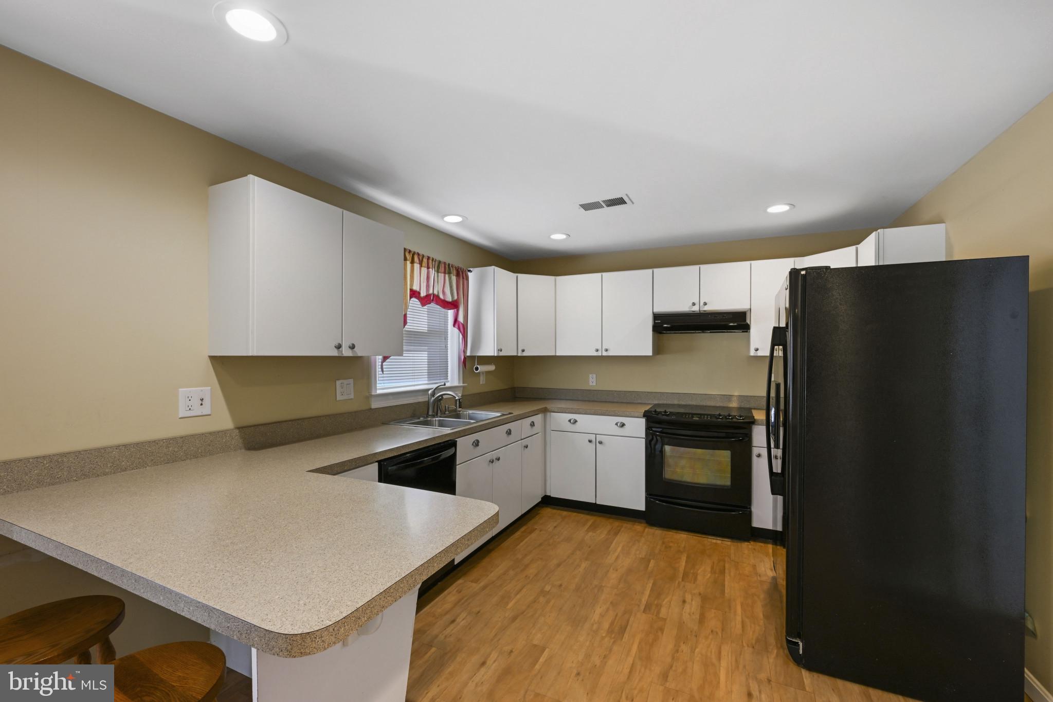 16966 Teagues Point Road Hughesville, MD 20637 - Photo 58 of 72 guest house kitchen