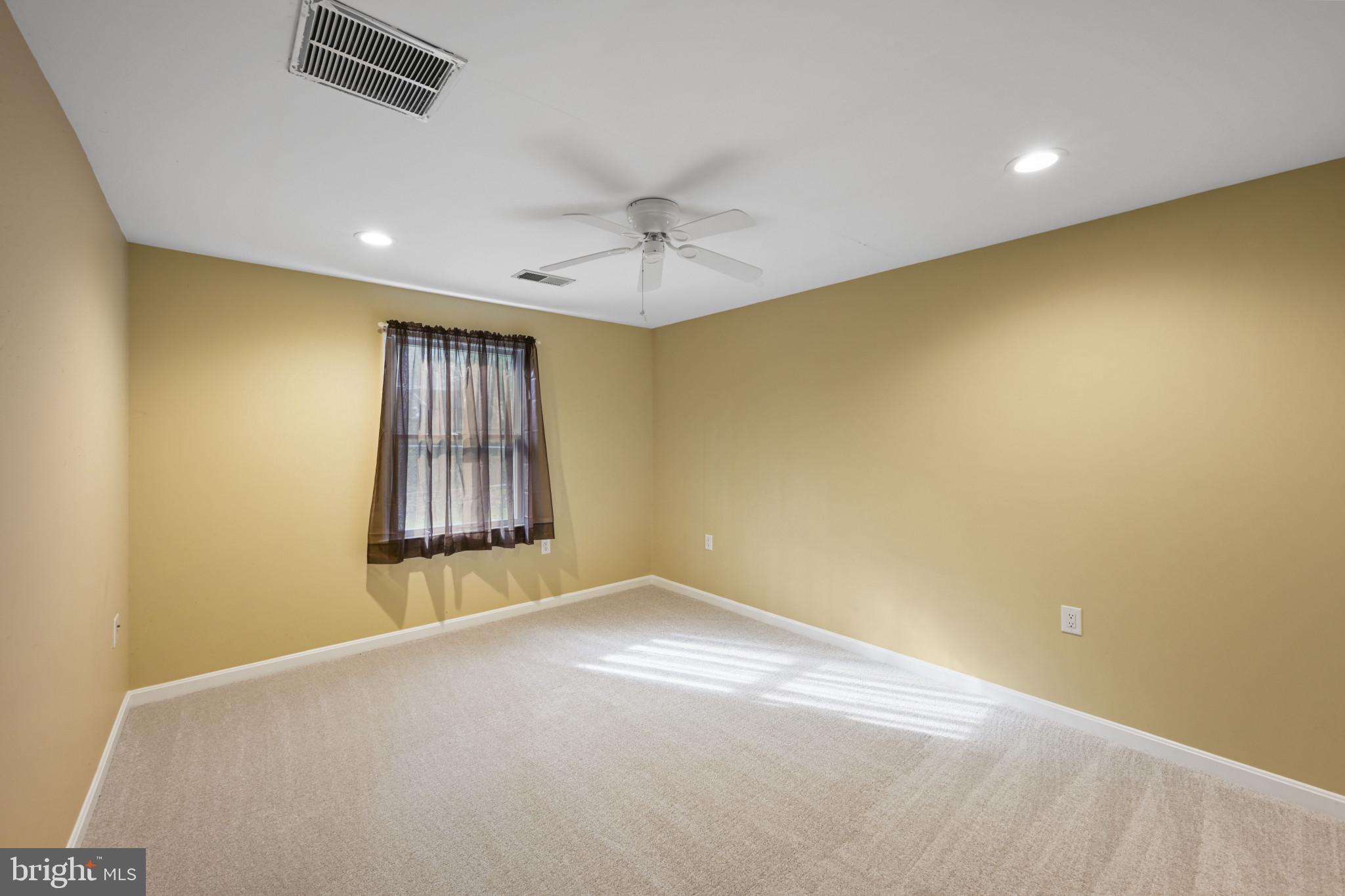 16966 Teagues Point Road Hughesville, MD 20637 - Photo 60 of 72 a view of an empty room with a window