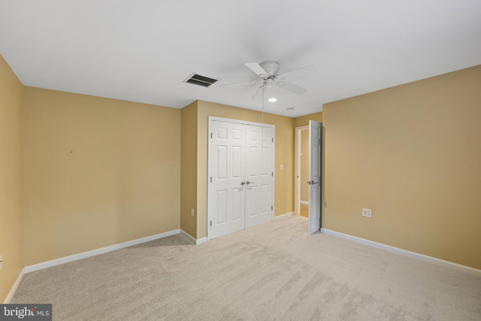 16966 Teagues Point Road Hughesville, MD 20637 - Photo 63 of 72 bedroom featuring light colored carpet