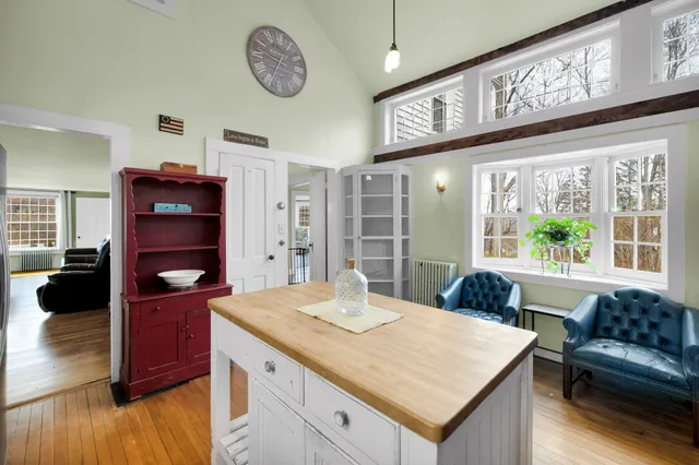 a very nice looking living room with a large window