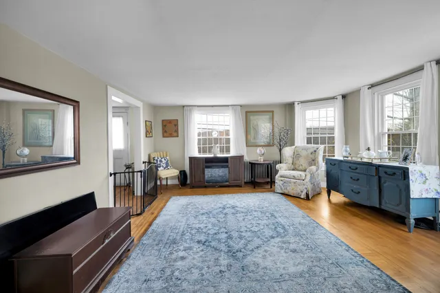 a spacious bedroom with furniture and a couch