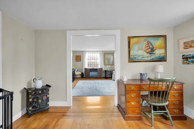 a view of a livingroom with furniture and toys