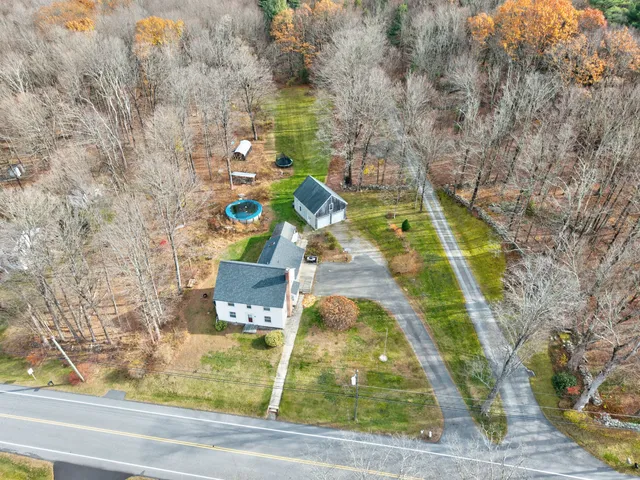a view of swimming pool with a yard