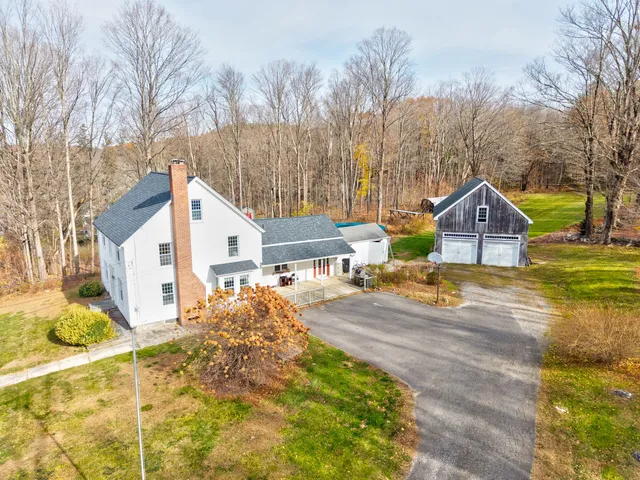 a house with trees in front of it