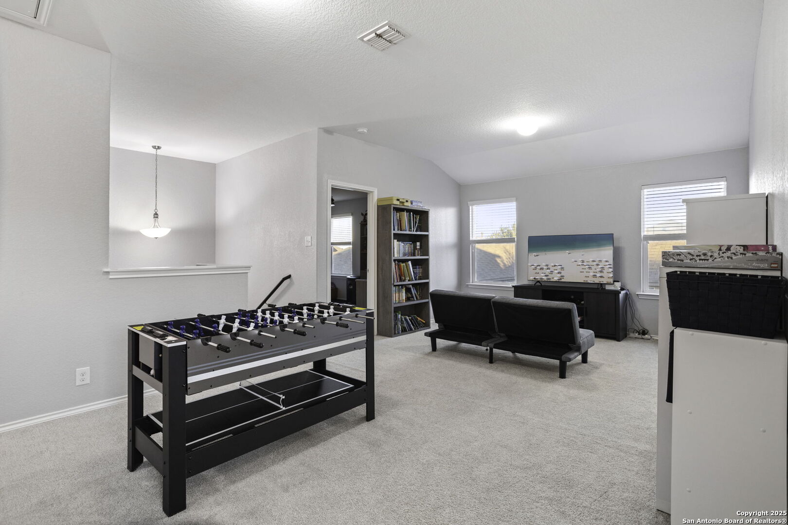 212 Kildeer Creek San Antonio, TX 78253 - Photo 16 of 29 a bedroom with furniture and a rug