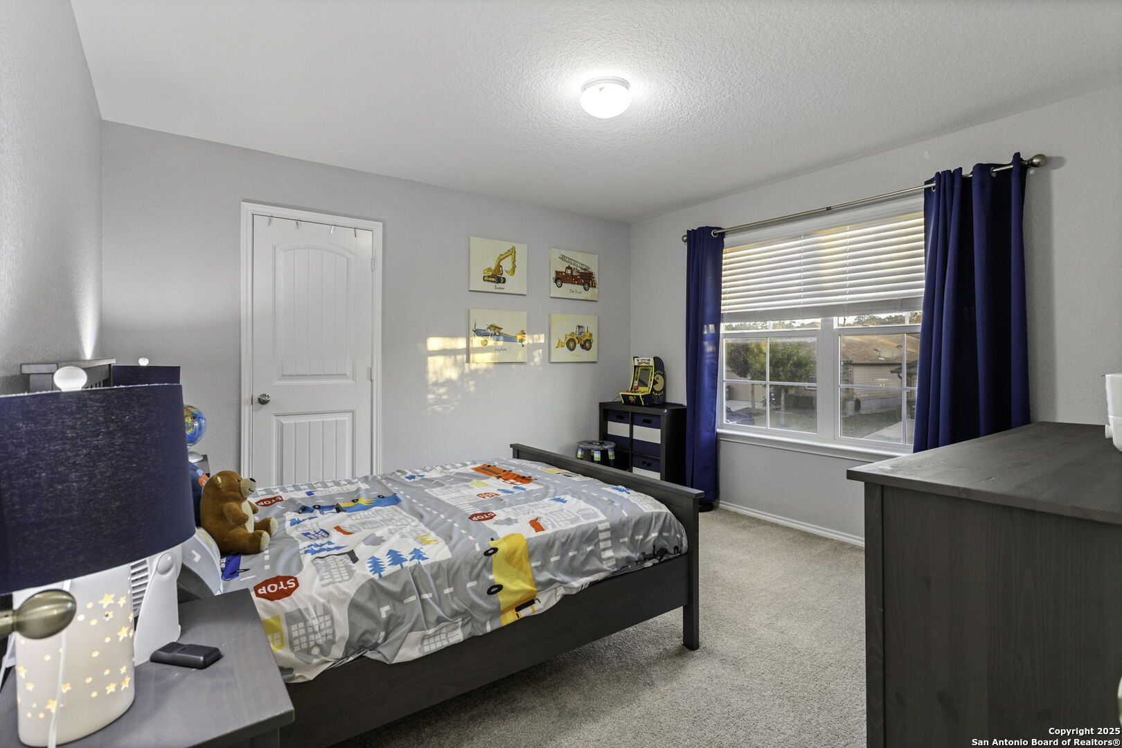 212 Kildeer Creek San Antonio, TX 78253 - Photo 18 of 29 a bedroom with a bed and a window