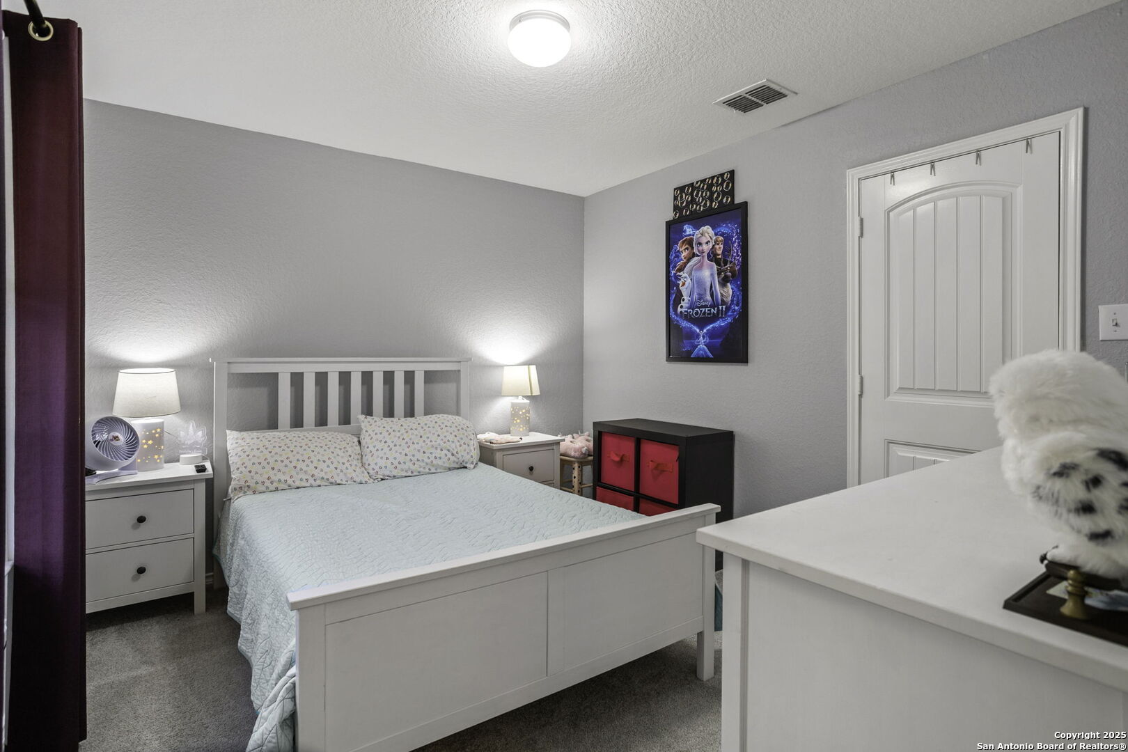 212 Kildeer Creek San Antonio, TX 78253 - Photo 19 of 29 a bedroom with a bed and a cabinets