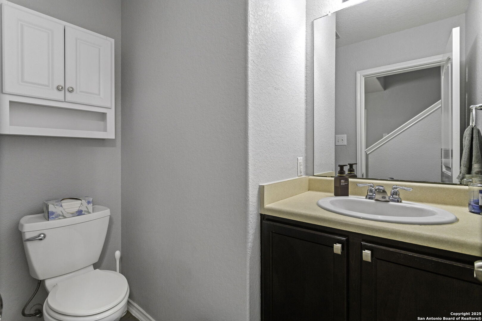 212 Kildeer Creek San Antonio, TX 78253 - Photo 22 of 29 a bathroom with a toilet sink and mirror