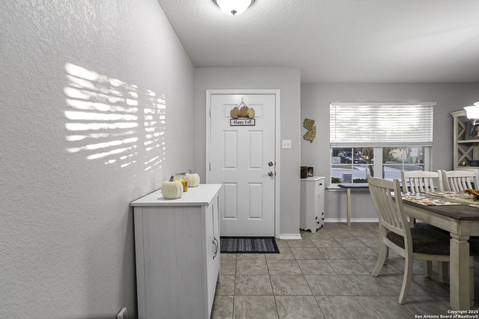 212 Kildeer Creek San Antonio, TX 78253 - Photo 4 of 29 a room that has a lot of furniture and a window in it