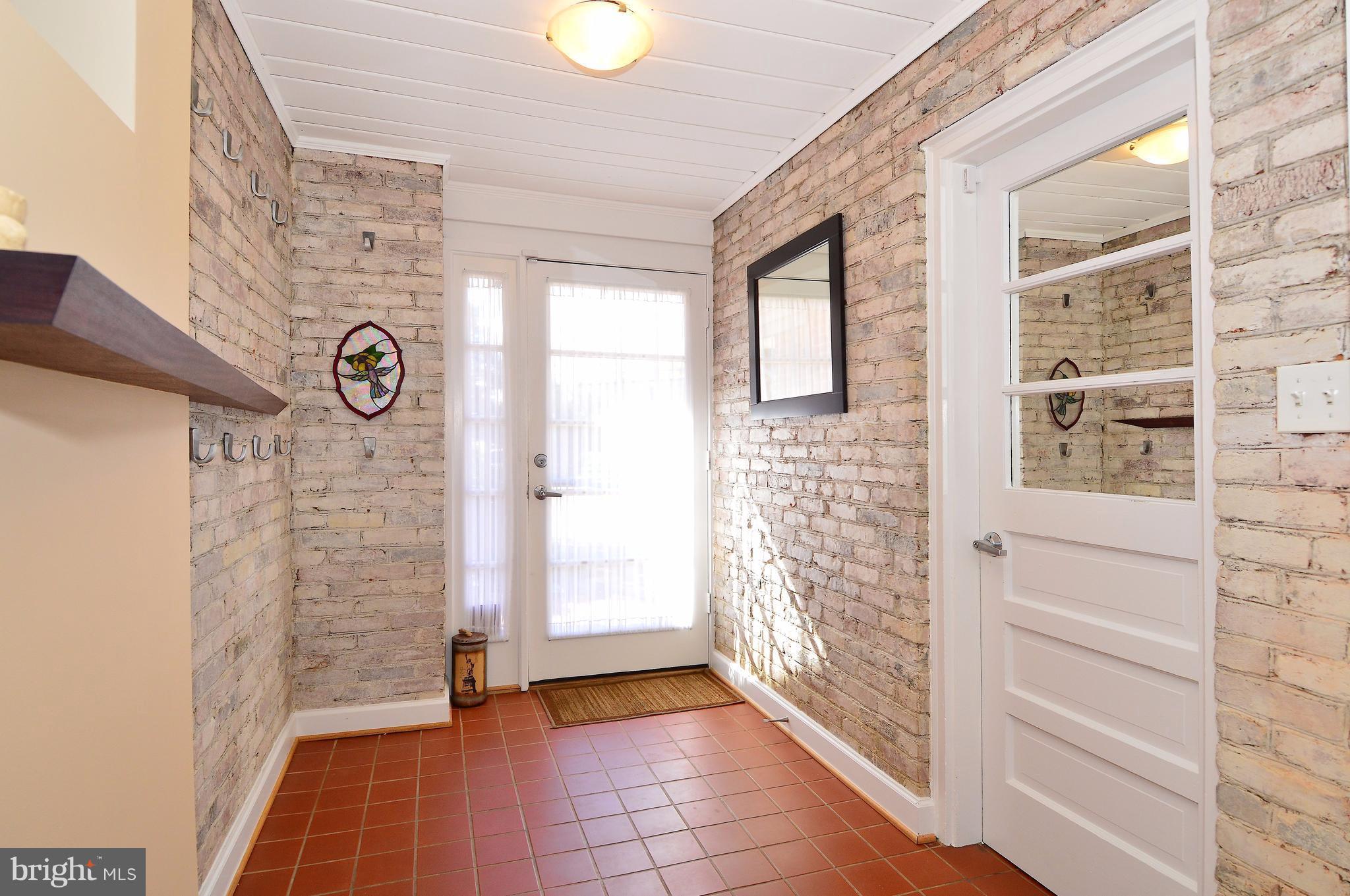 6448 Elmdale Road Alexandria, VA 22312 - Photo 22 of 28 Garage Side Door Breezeway Mud Room