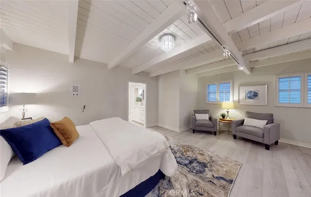 a view of a chairs and table in patio with a yard