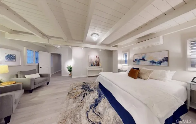 a view of a dinning table and chairs in patio with wooden fence