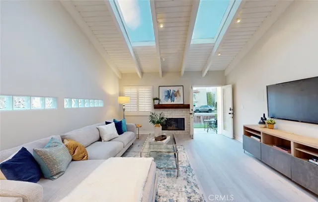 a view of a living room and a floor to ceiling window