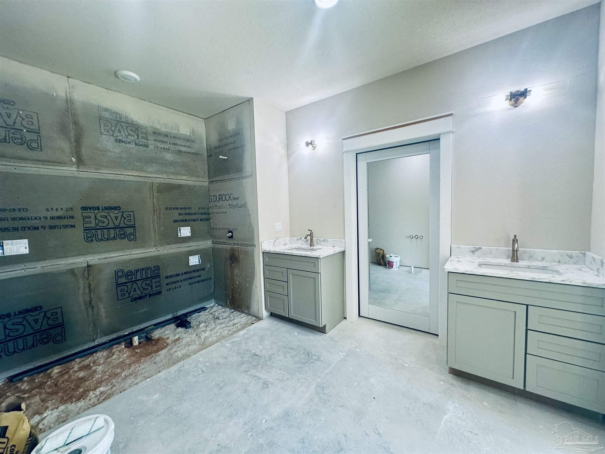 5009 Timber Ridge Drive Pace, FL 32571 - Photo 31 of 72 a room with storage and utility