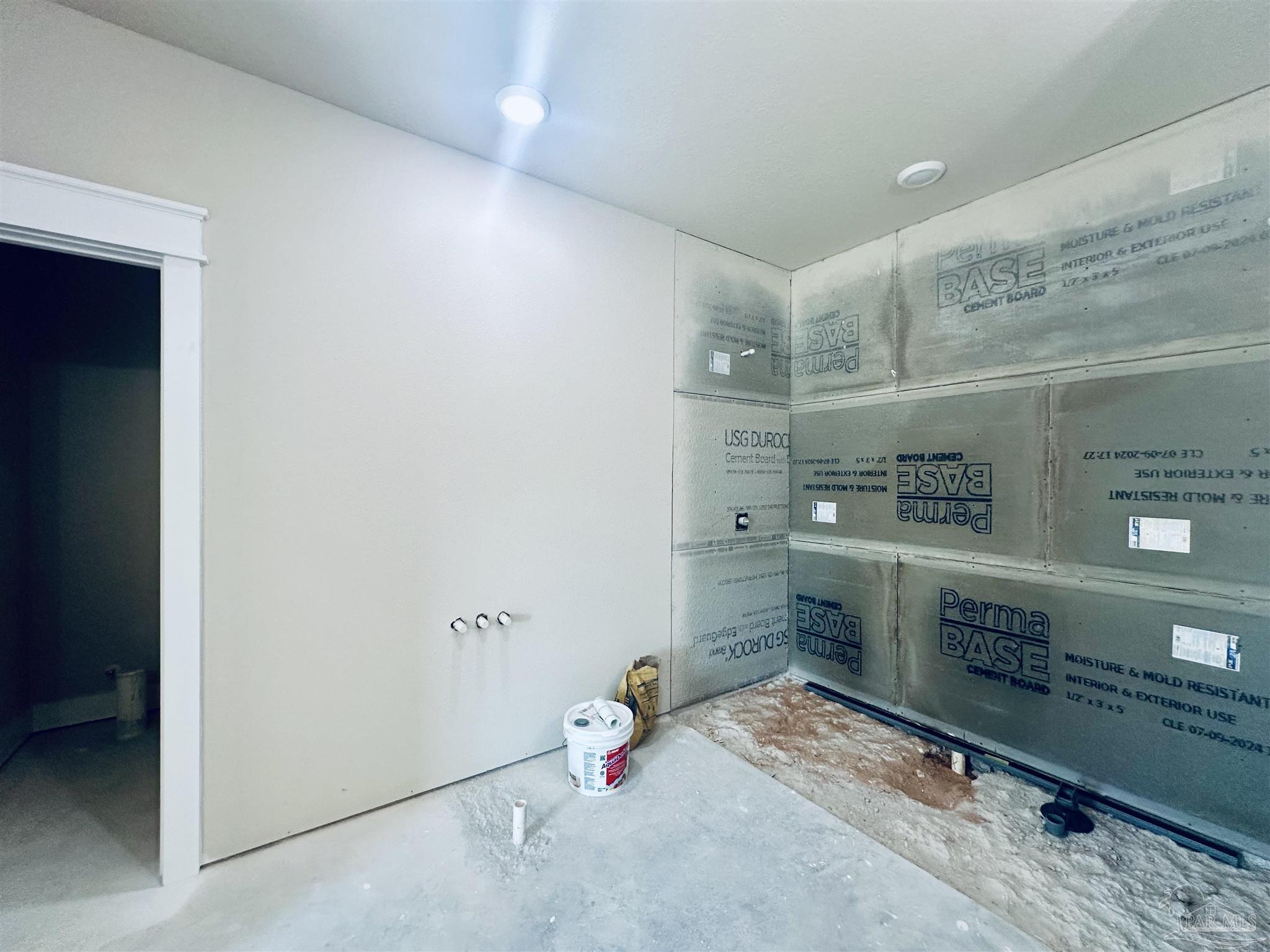 5009 Timber Ridge Drive Pace, FL 32571 - Photo 32 of 72 a bathroom with a sink and a mirror