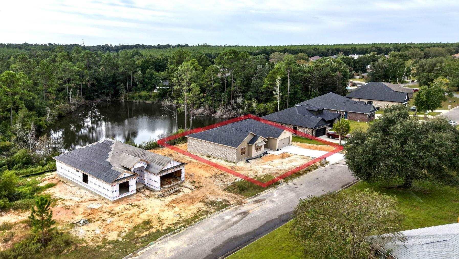 5009 Timber Ridge Drive Pace, FL 32571 - Photo 60 of 72 an aerial view of house with yard