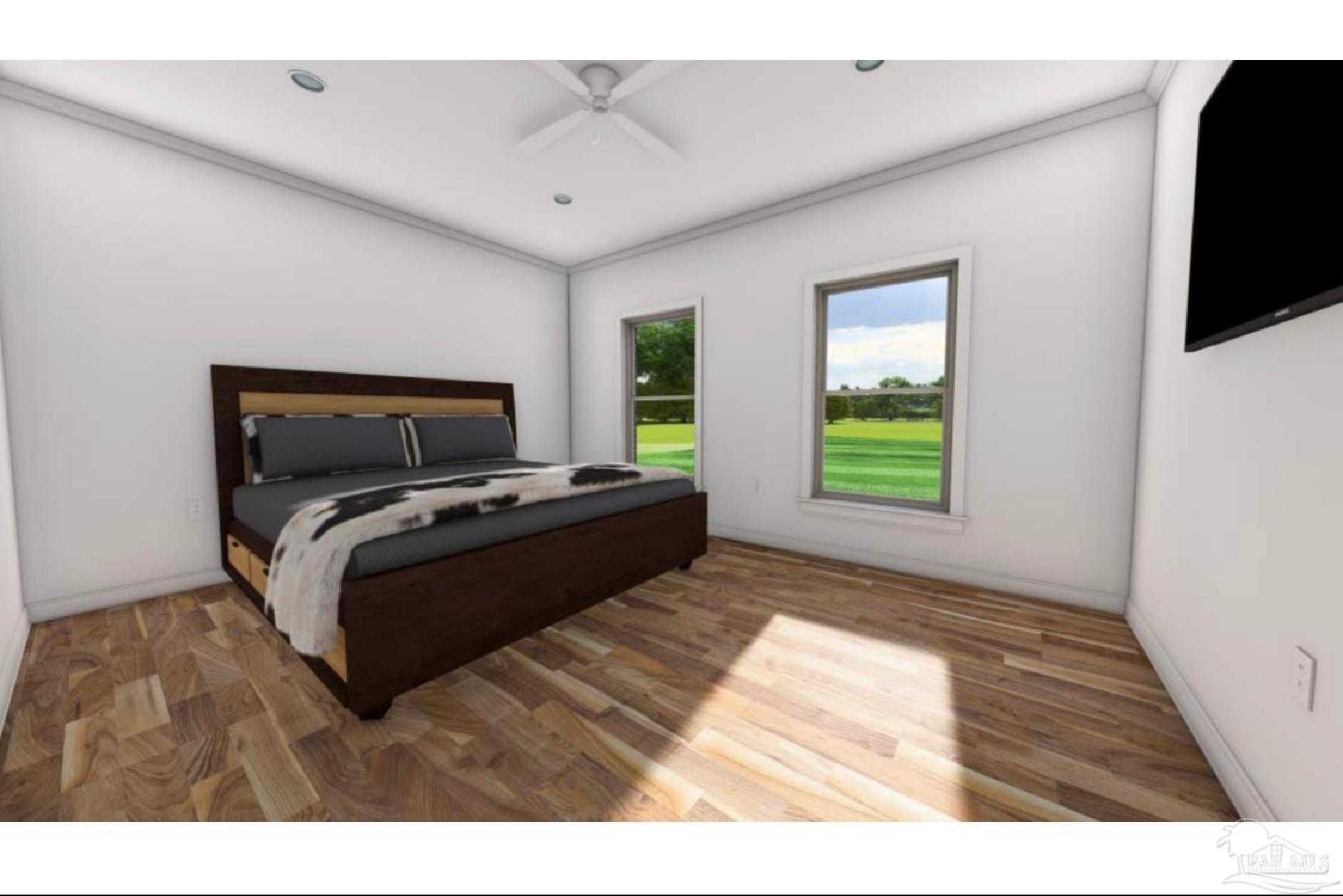 5009 Timber Ridge Drive Pace, FL 32571 - Photo 65 of 72 a bedroom with a bed and a flat tv screen