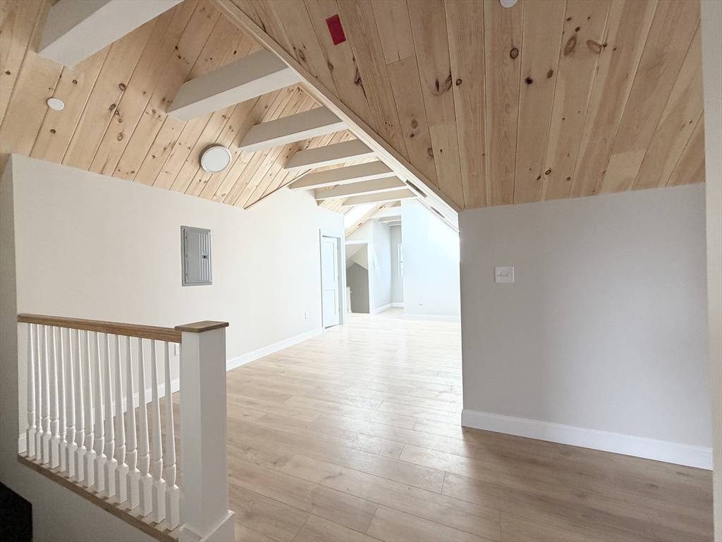 3 1/2 Buffum Street, Unit 3 Salem, MA 01970 - Photo 2 of 10 a view of a hallway view with staircase