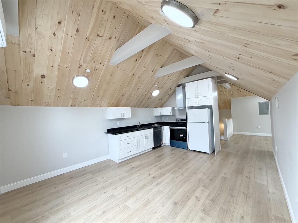3 1/2 Buffum Street, Unit 3 Salem, MA 01970 - Photo 9 of 10 a view of a room with wooden floor