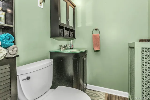 a view of a house with a snow on the road