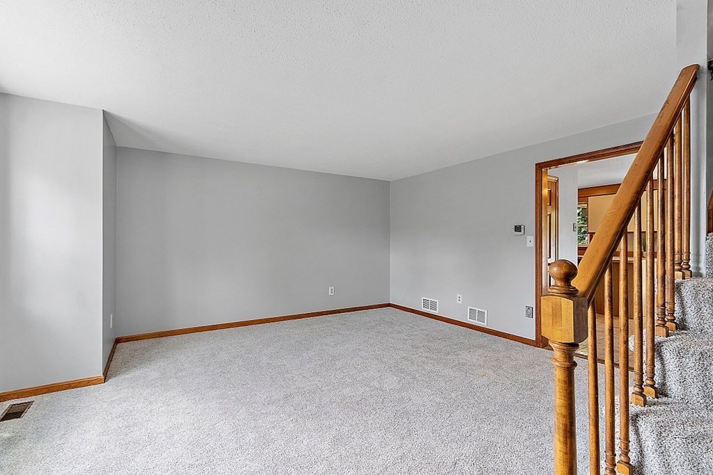 25 Juniper Place, Unit 9 Lowell, MA 01852 - Photo 18 of 42 a view of an empty room