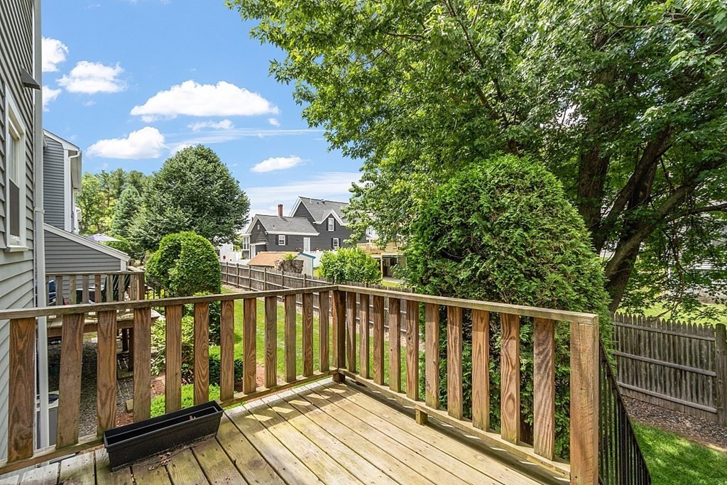 25 Juniper Place, Unit 9 Lowell, MA 01852 - Photo 32 of 42 a view of balcony with wooden floor