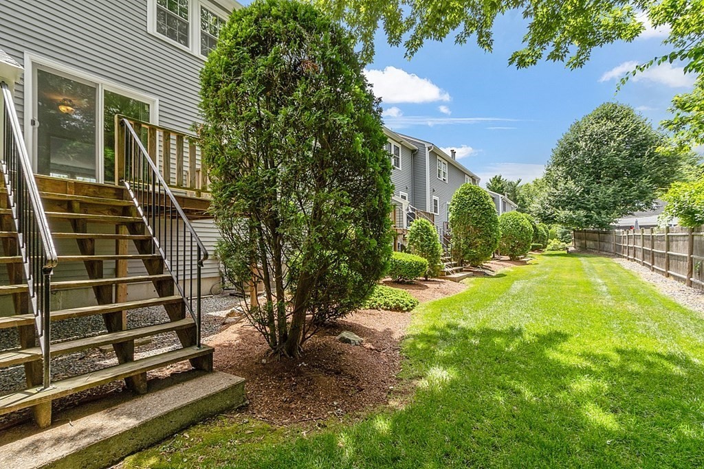 25 Juniper Place, Unit 9 Lowell, MA 01852 - Photo 36 of 42 a view of backyard with a small pool