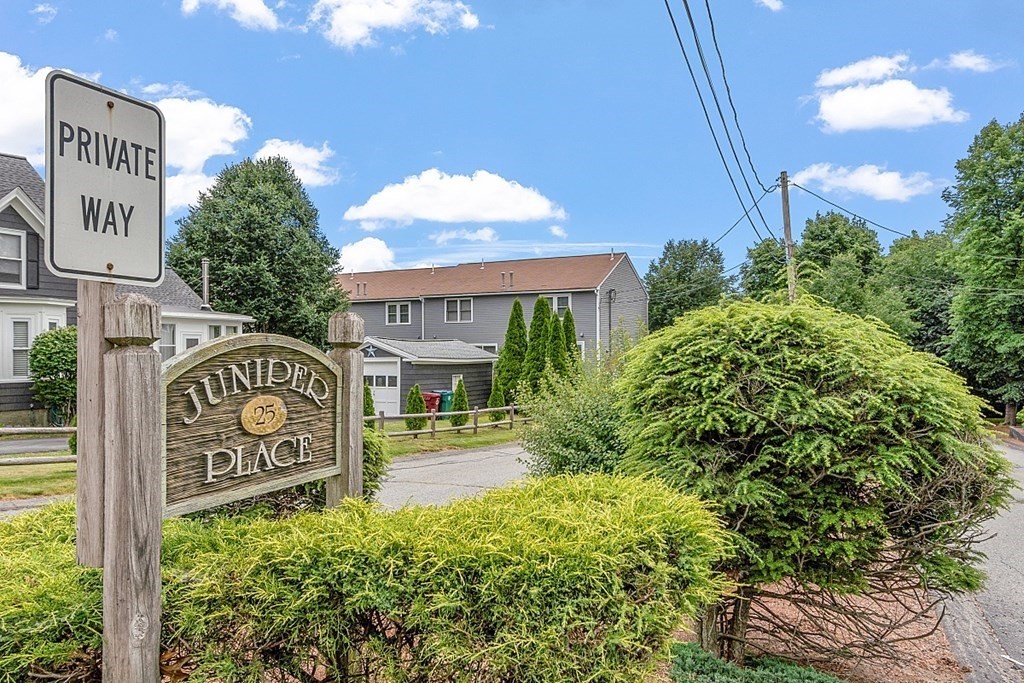 25 Juniper Place, Unit 9 Lowell, MA 01852 - Photo 42 of 42 a sign on the side of a building