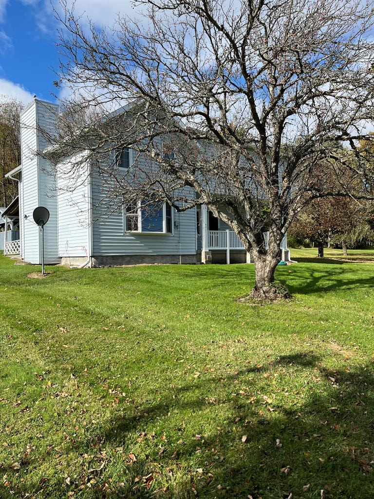 12391 Jackson Run Road Sugar Grove, PA 16350 - Photo 1 of 40 a view of a house with a big yard