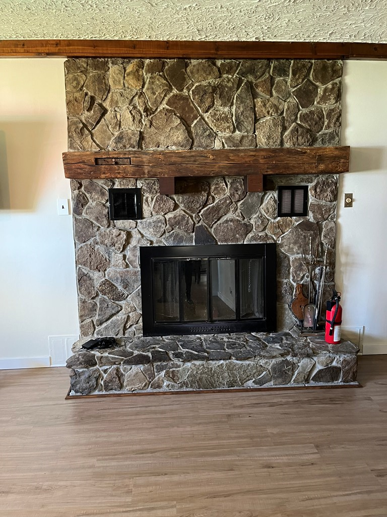 12391 Jackson Run Road Sugar Grove, PA 16350 - Photo 3 of 40 a view of fireplace and wooden floor