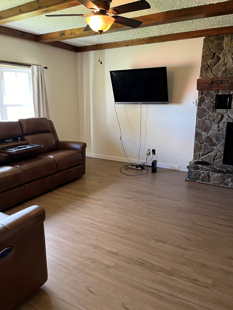 12391 Jackson Run Road Sugar Grove, PA 16350 - Photo 4 of 40 a living room with furniture and a flat screen tv