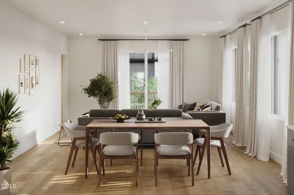 a view of a dining room with furniture and window