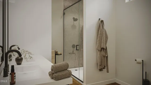 a bathroom with a sink and a shower