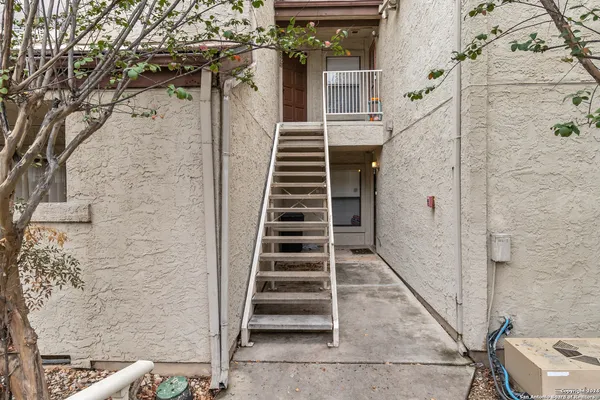 a view of entryway with wooden floor