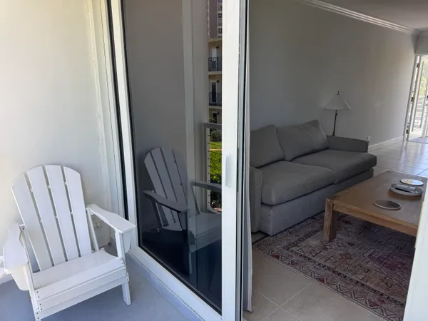 a living room with furniture and a gate