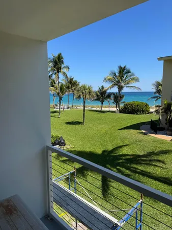 a view of swimming pool from a yard