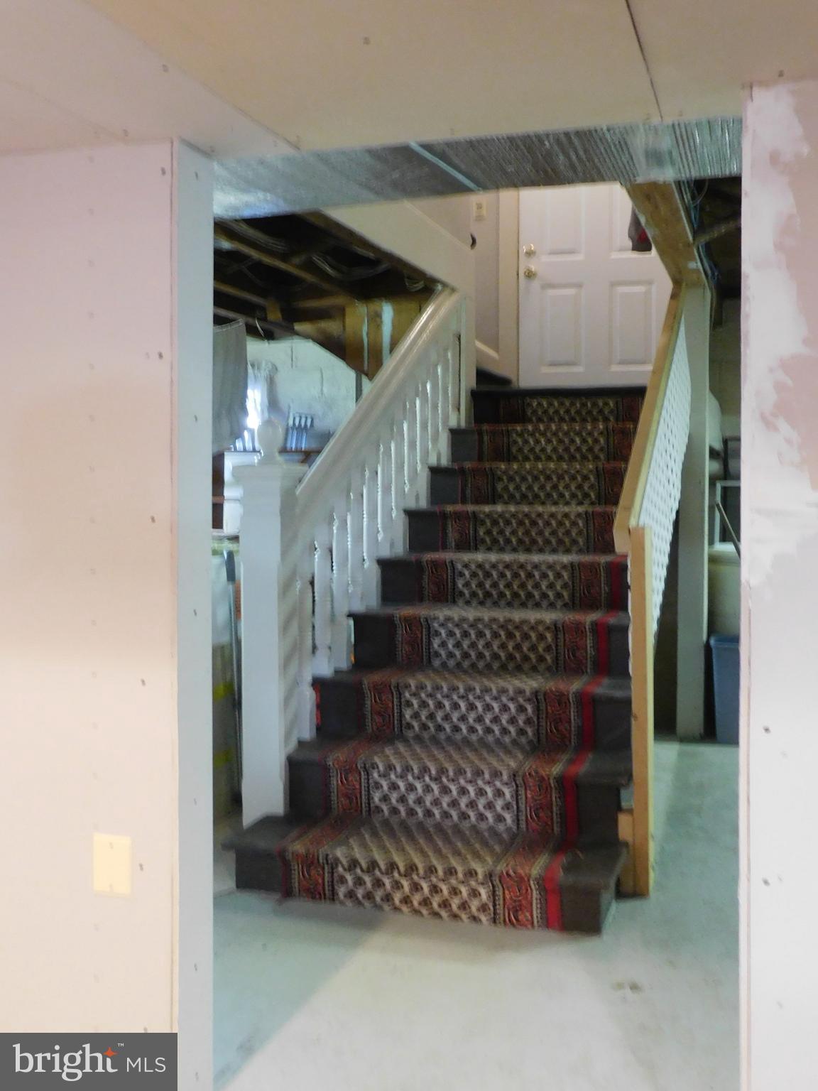415 Lippincott Avenue Riverside, NJ 08075 - Photo 46 of 60 Stairs from kitchen to basement. shows rear door.