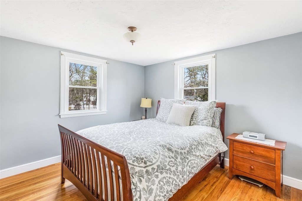 31 Gerard Road Norwell, MA 02061 - Photo 14 of 30 a bedroom with a bed and wooden floor