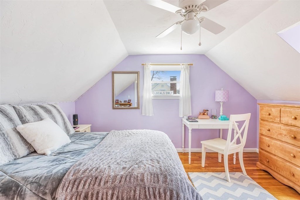 31 Gerard Road Norwell, MA 02061 - Photo 19 of 30 a bedroom with a bed and a chandelier