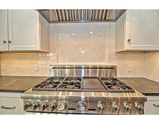 2 Snowy Owl Road Hopkinton, MA 01748 - Photo 7 of 30 a kitchen with a stove