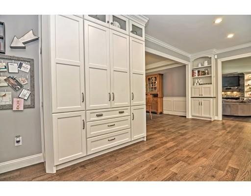 2 Snowy Owl Road Hopkinton, MA 01748 - Photo 8 of 30 a view of a kitchen with wooden cabinet