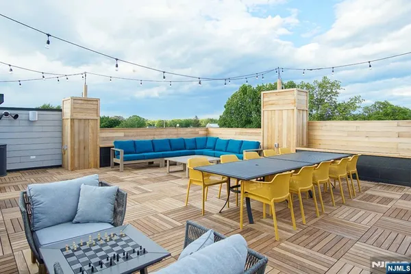 a view of a terrace with furniture